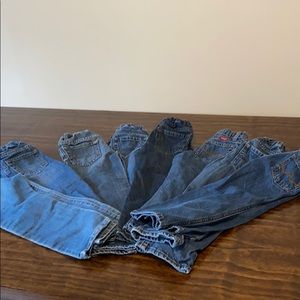 8 pair of blue jeans